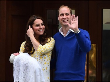 Britain's Prince William, Duke of Cambridge, and his wife Catherine, Duchess of Cambridge show their newly-born daughter, their second child, to the media outside the Lindo Wing at St Mary's Hospital in central London, on May 2, 2015.  The Duchess of Cambridge was safely delivered of a daughter weighing 8lbs 3oz, Kensington Palace announced. The newly-born Princess of Cambridge is fourth in line to the British throne.