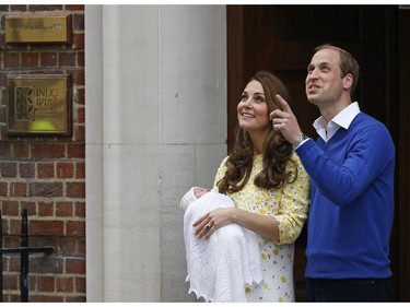 Britain's Prince William and Kate, Duchess of Cambridge and their newborn baby princess, pose for the media as they leave St. Mary's Hospital's exclusive Lindo Wing, London, Saturday, May 2, 2015.  Kate, the Duchess of Cambridge, gave birth to a baby girl on Saturday morning.