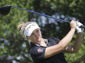 Brooke Henderson watches her tee shot on the second hole during the final round of the LPGA North Texas Shootout golf tournament on Sunday, May 3, 2015, in Irving, Texas.