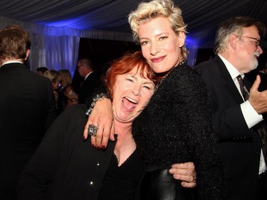 Canadian actress and comedian Mary Walsh gets a big squeeze from fellow actress Sarain Boylan at the VIP afterparty for the Governor General's Performing Arts Awards Gala held at the National Arts Centre on Saturday, May 30, 2015.