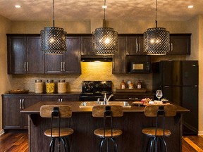 Dark brown cabinetry and laminate countertops create a warm look in the Tahoe kitchen.
