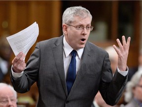 NDP MP Charlie Angus asks a question during question period in the House of Commons on Parliament Hill in Ottawa on Thursday, March 12, 2015. New Democrats are pushing to have the House of Commons ethics committee conduct an emergency study of the RCMP's illegal destruction of gun registry records.