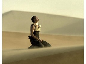 This photo provided by Warner Bros. Pictures shows Charlize Theron as Imperator Furiosa in Warner Bros. Pictures' and Village Roadshow Pictures' action adventure film, "Mad Max:Fury Road," a Warner Bros. Pictures release.