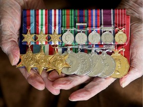 Gordon MacKay, 94, displays the many medals he won during his army career.