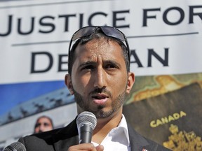 Deepan Budlakoti speaks to a small group of people outside the Supreme Court of Canada on May 26, 2015.