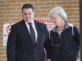 Former Conservative MP Dean Del Mastro leaves court with his mother Yvonne Del Mastro at his sentencing hearing in Lindsay, Ont., Tuesday, April 28, 2015.