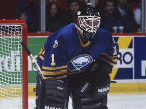 MONTREAL, CANADA - CIRCA 1995:  John Blue #1 of the Buffalo Sabres follows the action during a game against the Montreal Canadiens Circa 1995 at the Montreal Forum in Montreal, Quebec, Canada.