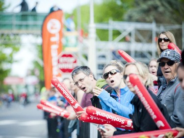 Fans and supporters cheer on the runners during the marathon at Tamarack Ottawa Race Weekend, Sunday, May 24, 2015.