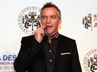 Filmmake Jean-Marc Vallée, recipient of the National Arts Centre Award, strikes one of the most popular poses among medal wniners, while at the Governor General's Performing Arts Award Gala held at the NAC on Saturday, May 30, 2015.