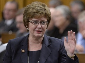 Public Works Minister Diane Finley answers a question during Question Period in the House of Commons in Ottawa on Wednesday, March 11, 2015.