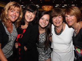 From left, Danielle Holleron with her sister, guest speaker Christine Caron, and Caron's daughter, Arielle Caron, her mother, Monique Bondar, and her aunt, Denise Pageau, at The Rehabilitation Centre Volunteer Association's Spring into Motion benefit held at the St. Elias Centre on Wednesday, May 13, 2015.