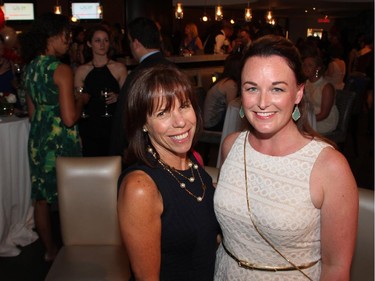 From left, Debi Zaret and Emily Porter, both board members with Dress for Success, at its fifth annual Stepping Out! fundraiser held at Lago Bar/Gill/View on Thursday, May 28, 2015.