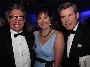 From left, Dennis Laurin with his wife, Andrea, and Grant McDonald, a member of the National Arts Centre Foundation board, at the Governor General's Performing Arts Awards Gala held at the NAC on Saturday, May 30, 2015.
