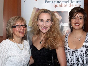 From left, Joanne Silkauskas with Chantelle Bowers and Tara-Marie Andronek at the Reach Cabaret Fundraiser held at the St. Elias Centre on Wednesday, May 20, 2015.