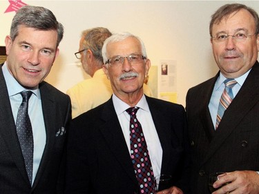 From left, KPMG managing partner Grant McDonald with Ottawa Art Gallery board chair Lawson Hunter, counsel with Stikeman Elliott LLP, and fellow board member Vic Duret, partner at KPMG, at the OAG's annual Le pARTy art auction fundraiser, held Thursday, May 21, 2015.
