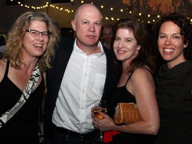 From left, Stephanie Potter with her brother, Citizen editor Andrew Potter, and Sarah Burns and Ottawa Riverkeeper staff member Stephanie Bolt at the third annual Ottawa Riverkeeper Gala held Wednesday, May 27, 2015, at Albert Island on the Ottawa River.