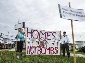 This file photo from 2014 shows protests outside CANSEC at the EY Centre.