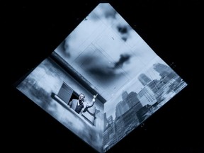 Robert Lepage has restaged his 20-year-old play Needles and Opium. The action takes place inside this cube.