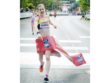Hannah Rachel celebrates her first marathon with a first Canadian woman title at Tamarack Ottawa Race Weekend, Sunday, May 24, 2015.