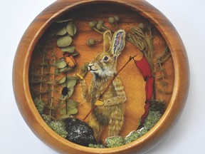 Hare & Beetles (Acrylic, resin, eucalyptus, 
moss, beetles, mushrooms,
 found bowl, 12" diameter) by Drew Mosley, at Ottawa Art Gallery.