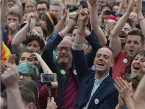 Thousands of people celebrate in Dublin Castle Square as the result of the referendum is relayed on May 23, 2015 in Dublin, Ireland.  More than 62% voted in favour of amending the country's constitution to allow gay and lesbian couples to marry. It is the first country in the world to legalise same-sex marriage through a popular vote.