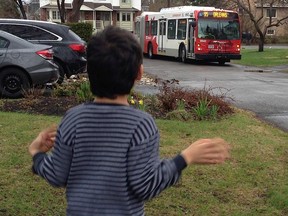 A photo by Kathleen O'Grady of the bus that came down her quiet street unexpectedly, to the delight of her autistic son.