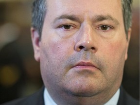 Defence Minister Jason Kenney speaks with the media following a ceremony to re-name a government building the Valour Building Monday May 25, 2015 in Ottawa.