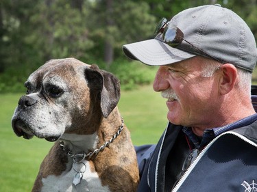 Eric Ruhs and his dog Bunker at the Ottawa Hunt, chases nuisance birds away, keep the peace with squirrels, and generally keep the members happy.