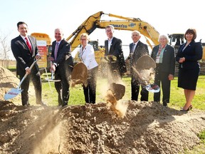 Ontario Premier Kathleen Wynne is joined by, from left, MP Pierre Poilievre, Ciena senior vice-president James Frodsham, Ottawa Mayor Jim Watson, MPP Bob Chiarelli, Kanata North councillor Marianne Wilkinson and MPP Marie-France Lalonde at a groundbreaking ceremony for new Ciena Corp. buildings in Kanata.