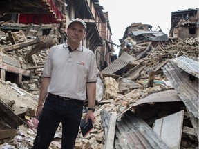 World Vision Canada incoming president and CEO Michael Messenger standing in the rubble of a collapsed building in Kathmandu during his visit to Nepal in the immediate aftermath of the April 25th earthquake.
