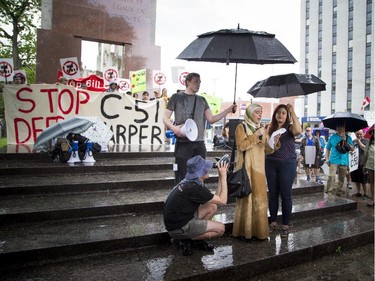 Monia Mazigh spoke to the group of protesters at the Human Rights Monument during a protest of the government's proposed anti-terrorism legislation, Bill C-51, Saturday, May 30, 2015.