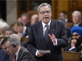 Finance Minister Joe Oliver answers a question during Question Period in the House of Commons in Ottawa on Tuesday, May 26, 2015.