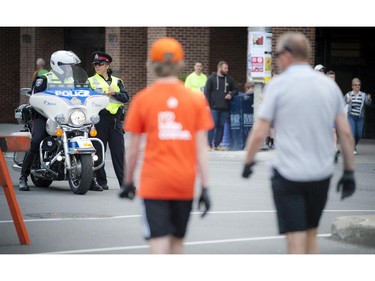 Ottawa Police closed off streets to vehicles for the runners at Tamarack Ottawa Race Weekend Saturday May 23, 2015.