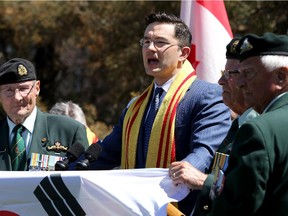 Pierre Poilievre addresses the crowd. More than 500 people came out for the inaugural Journey to Freedom Day Thursday to commemorate the 40th anniversary of the fall of Saigon and to recognize the exodus of Vietnamese refugees and boat people to Canada. Vietnamese Senator Thanh Hai Ngo was also joined by Defense Minister, Jason Kenney, and Minister of Employment and Social Development and Democratic Reform, Pierre Poilievre, in a rally of support for the Memorial to the Victims of Communism beside the Supreme Court (where memorial is slated to be built) before the march to Parliament Hill.