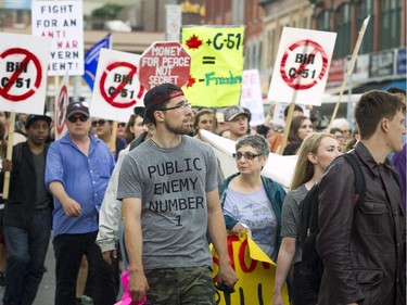 Hundreds made their way through the Market, protesting the government's proposed anti-terrorism legislation, Bill C-51, Saturday, May 30, 2015.
