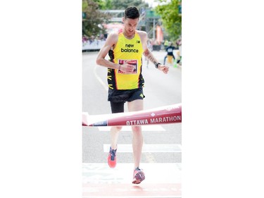 Rob Watson was the first Canadian man to finish the marathon at Tamarack Ottawa Race Weekend, Sunday, May 24, 2015.