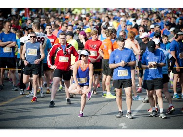 Runners get ready for the start of the 10K race at Tamarack Ottawa Race Weekend, Saturday May 23, 2015.