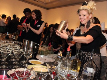 Sara Ainslie from The Mercury Lounge was on bartending duties at Le pARTy art auction fundraiser for the Ottawa Art Gallery held Thursday, May 21, 2015.