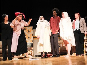 Selma played by Zara Barghouth (L), Dotty played by Jessica Paquette (2ndFL), Poppy played by Rebecca Conrod (3rdFL), Lloyd played by Salman Omar (4thFL), Brooke played by Amanda Nicholls (4thFR), Belinda played by Olivia Kennedy (3rdFR), Garry played by Eric McGlashan (2ndFR), and Frederick played by Nicholas Gobeil (R), during St. Patrick's High School's Cappies production of Noises Off, on April 30.