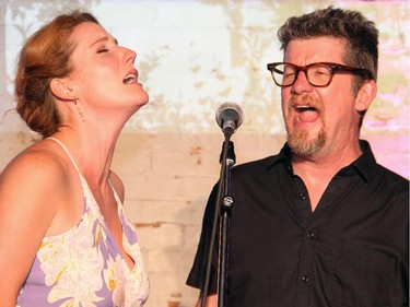 Singer-songwriter and Ottawa Riverkeeper board member Kathleen Edwards performed on stage with Andy Maize from the Skydiggers during the Ottawa Riverkeeper Gala held at Albert Island on Wednesday, May 27, 2015.