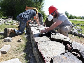 Students of the heritage masonry course at the Algonquin College Perth Campus are building a 40-foot long dry stone wall, a centuries-old technique used in Europe to enclose farm fields and church cemeteries.