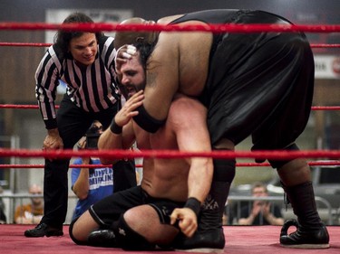 Soa Amin grabs Hannibal as Brazeau loooks on.