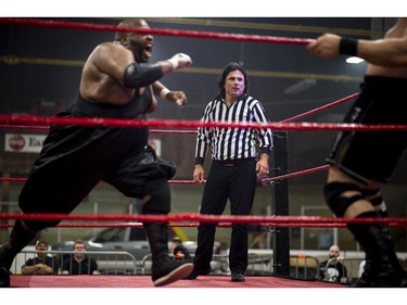Brazeau referees a heavy weight championship match between Hannibal (Devon Nicholson) and Soa Amin (Rodney Kellman) at the Great North Wrestling match as a special guest referee at Earl Armstrong centre on Saturday, May 30, 2015.