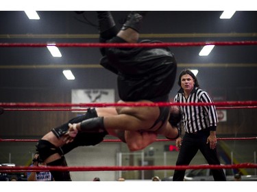 The acrobats continue at the Great North Wrestling match on Saturday, May 30, 2015.