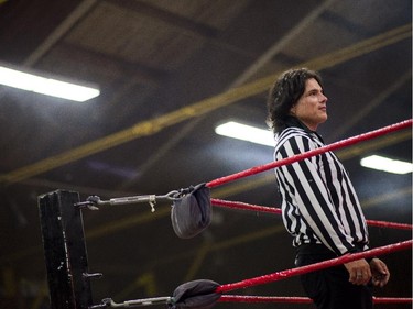 Suspended senator Patrick Brazeau takes a moment of quiet at the Great North Wrestling match on Saturday, May 30, 2015.