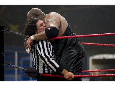 Pro wrestler Soa Amin crushes guest referee suspended senator Patrick Brazeau at the Great North Wrestling match on Saturday, May 30, 2015.