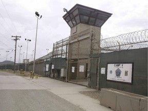 The entrance to Camp 5 and Camp 6 at the U.S. military's Guantanamo Bay detention center, which President Barack Obama has pledged to close amid opposition in Congress, at Guantanamo Bay Naval Base, Cuba, Saturday, June 7, 2014.