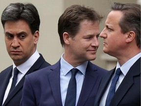 (L-R) Labour leader Ed Miliband, Liberal Democrat leader Nick Clegg and Prime Minister David Cameron participate in the 70th anniversary ceremony commemorating the end of the war in Europe May 8, 2015 in London, United Kingdom. Both Miliband and Clegg said they will resign their posts as party leaders after they were soundly beaten by Cameron and his Conservative Party in the recent general election.