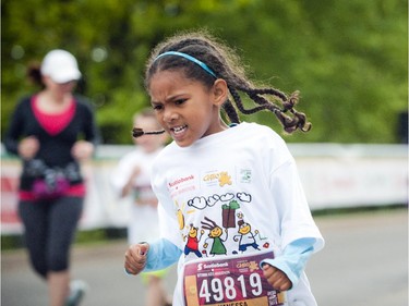 Vanessa Ephraim pushed to finish the kids marathon at Tamarack Ottawa Race Weekend, Sunday, May 24, 2015.