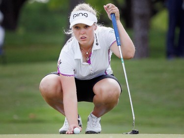 Brooke M. Henderson of Canada lines up a putt on the seventh green during Round Two of the 2015 Volunteers of America North Texas Shootout Presented by JTBC at Las Colinas Country Club on May 1, 2015 in Irving, Texas.